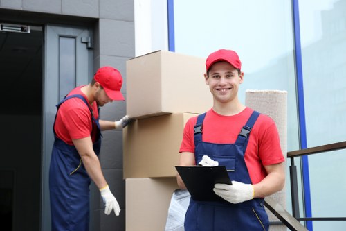 Professional local removals team loading boxes in Grahamepark